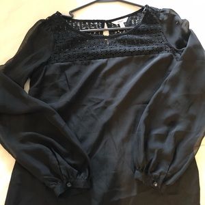 Black shirt with lace top.